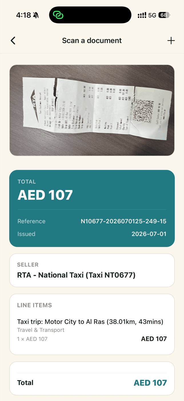 Scanning on the phone: a photographed taxi receipt read into its total, reference, issue date, seller and line item.
